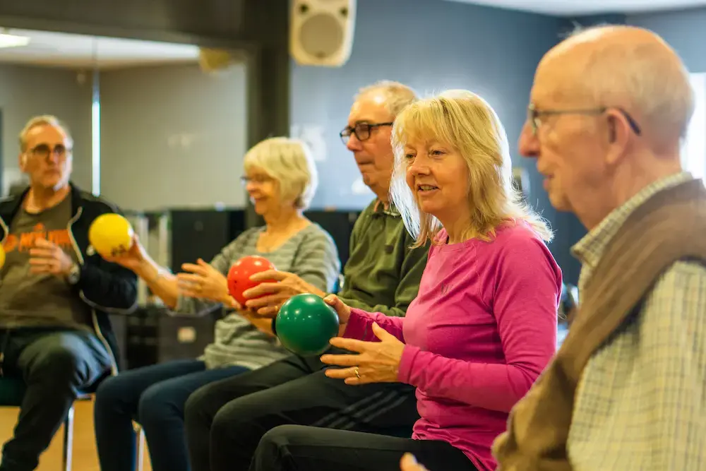 Group of older adults enjoying a game